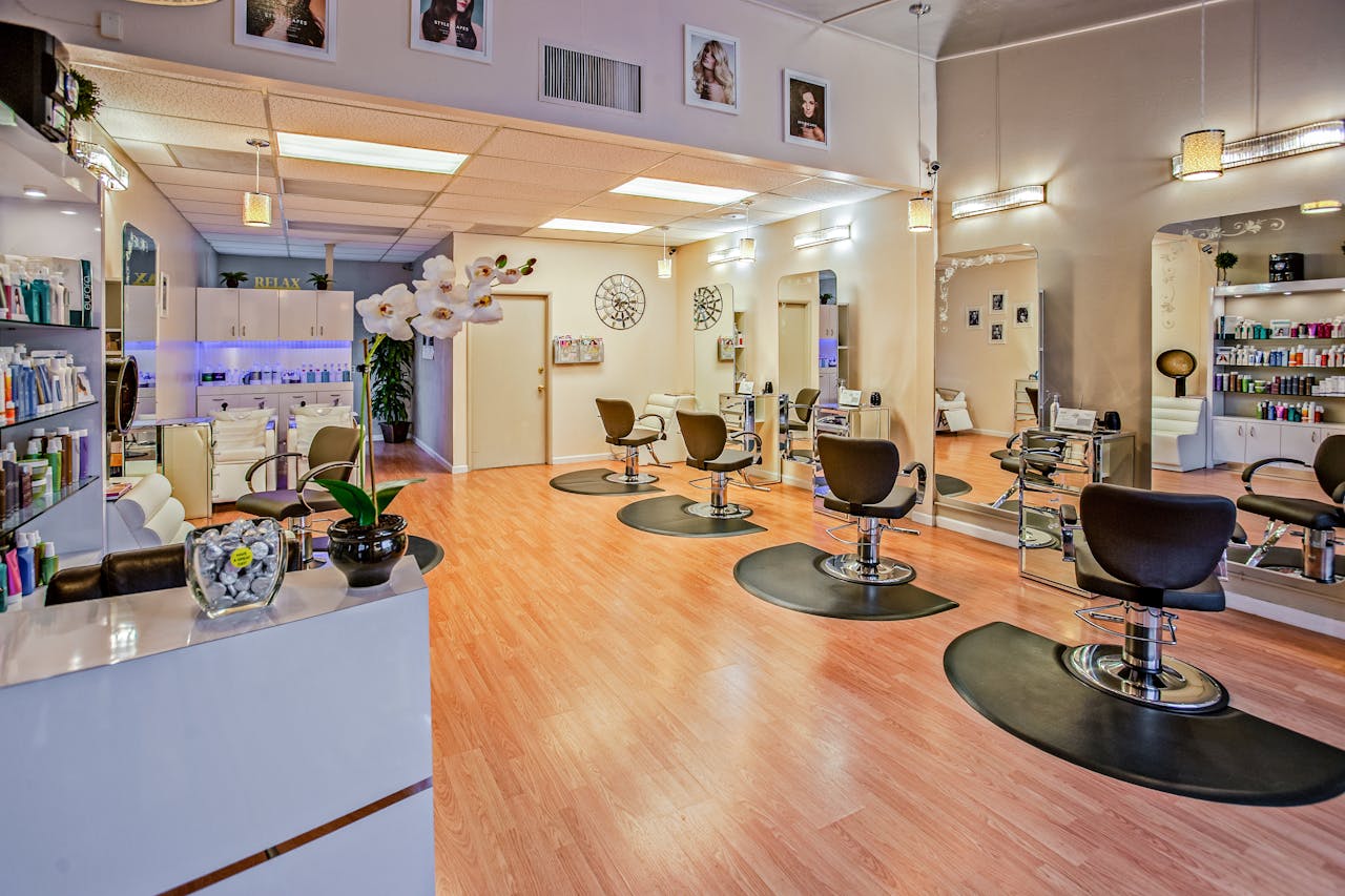 about-01 Spacious and stylish hair salon interior in Del Mar, CA showcasing chic design.